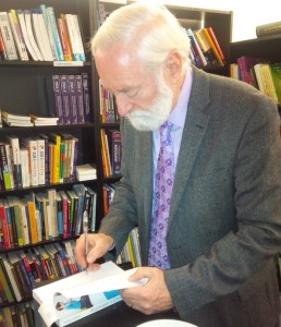 Dr. Robin Holloway signing his new book: Asperger's Children: Psychodynamics, Aetiology, Diagnosis, and Treatment